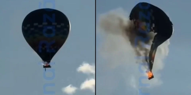 Pessoa se pendura e se joga de balão que pegou fogo em Santa Catarina.
Créditos: Reprodução de vídeo / Rede X