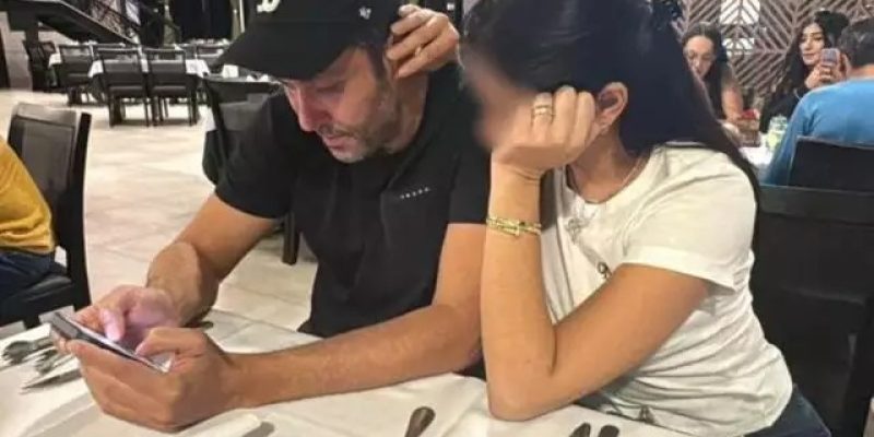 Claudinei Tolentino Marques com a esposa em restaurante, logo após ser solto (Foto: Reprodução)